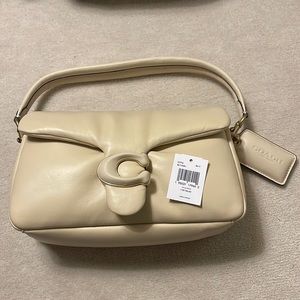Coach, brand new never used pillow tabby shoulder bag in Ivory